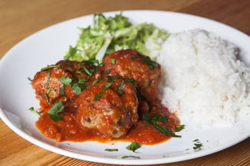 Meat balls with tomato sauce and white rice
