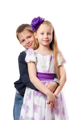 boy hugging a girl on a white background