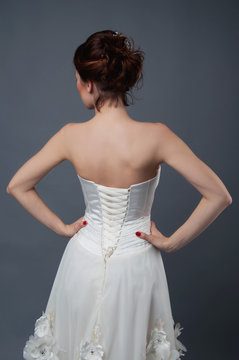 Bridal fashion. View from the back. Strapless dress.
