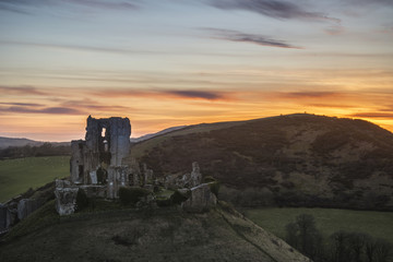 Landscape image of beautiful fairytale castle ruins during beaut