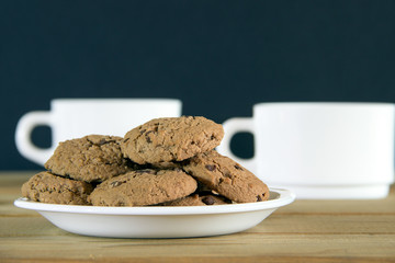Cookies and two cups of tea