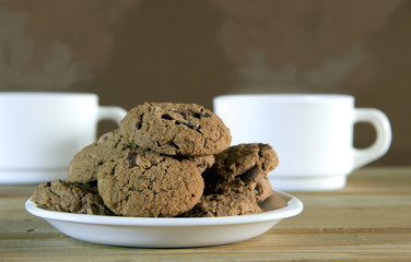 Cookies and two cups of hot tea