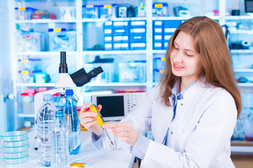 woman  technician in food quality control laboratory