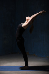 Obraz na płótnie Canvas Beautiful Yoga Woman Doing Ardha Chakrasana Pose