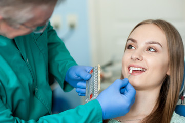 Dentist examining a patient's teeth