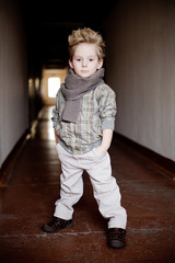 fashionable little boy in scarf