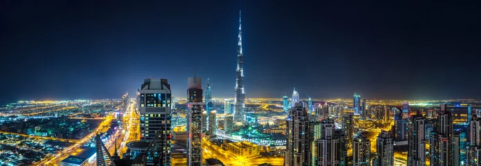 Zelfklevend Fotobehang Panorama of Dubai at night © Sergii Figurnyi