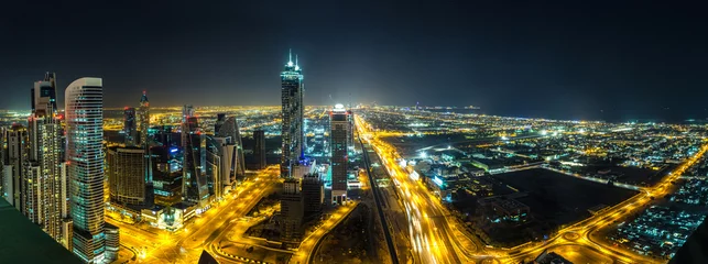 Schilderijen op glas Panorama of Dubai at night © Sergii Figurnyi