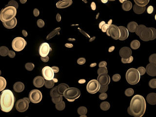 coins falling on dark background