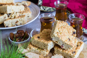 Shortbread cookies with nuts, tea, Oriental style