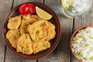 roasted schnitzel chop escalope with lemon tomato rice