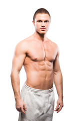 Fototapeta premium Strong, fit and sporty bodybuilder man isolated on white.