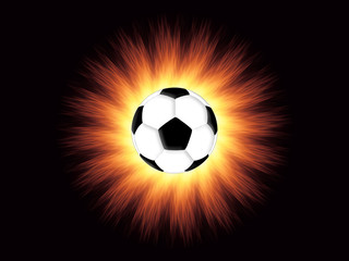 Football and flame on the black background