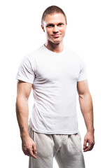 Obraz premium Strong, fit and sporty bodybuilder man isolated on white.