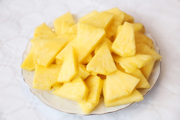 Sliced pineapple on a plate