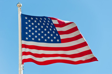 American flag against blue sky