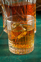 Glass of scotch whiskey and ice