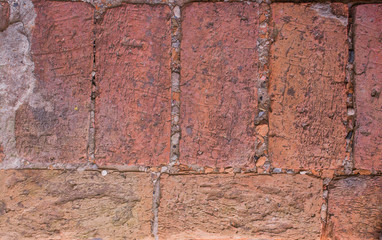 Old mossy brick wall
