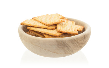 Simple crackers in a wooden bowl