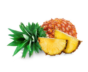 Pineapple with slices close-up isolated on white background.