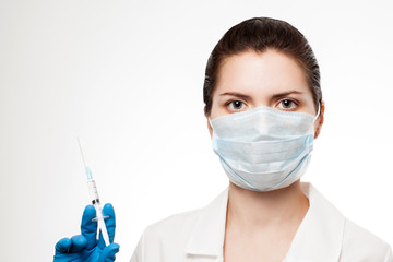 Medic holding syringe with vaccine in hand. Vaccination. Influenza