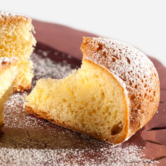 Slice of custard pie on white background