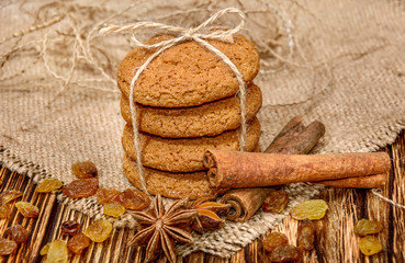 Oatmeal cookies with spices on burlap