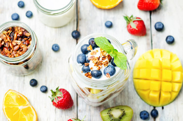 strawberry, mango, kiwi, blueberry, orange with Greek yogurt and