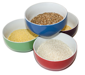 Various cereals in ceramic cups