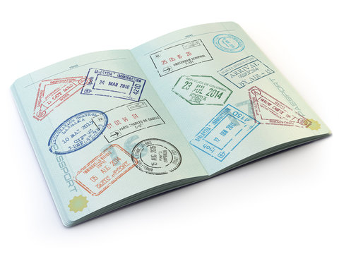 Opened passport with visa stamps on the  pages isolated on white