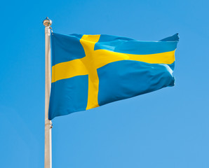 Flag of Sweden against blue sky