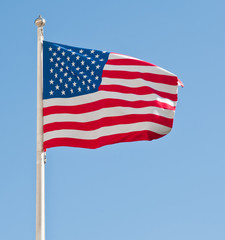 American flag against blue sky