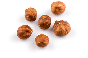 Hazelnuts on the white background