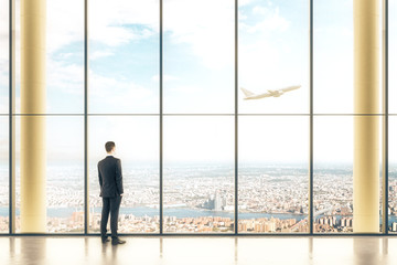 Interior with windows and businessman