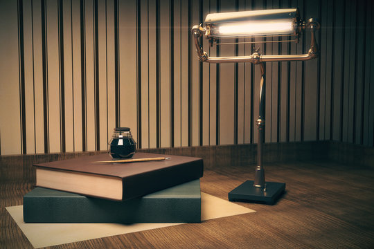 Tabletop with books and lamp