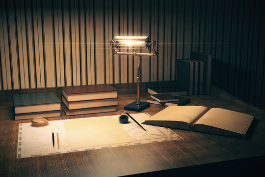 Desktop with books and lamp