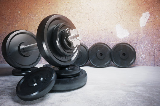 Dumbbell and plate row