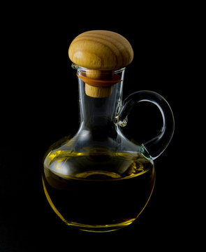 Bottle of olive oil  isolated on the black background
