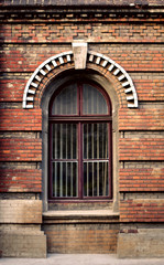 Fototapeta na wymiar Old wooden windows frame on cement cracked wall