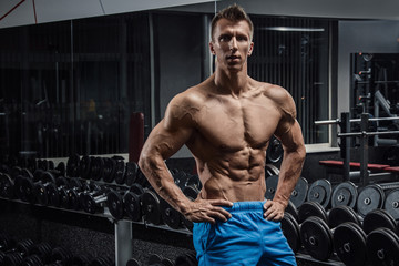 Fototapeta na wymiar Muscular man in gym