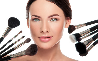 Female face and make up brushes