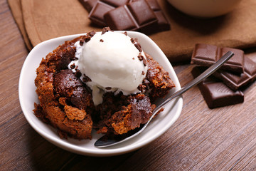 Served table of chocolate lava cake with ice-cream