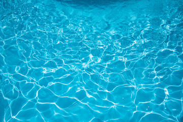Fototapeta na wymiar Beautiful rippled water in swimming pool