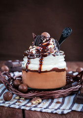 Chocolate mousse decorated with whipped cream