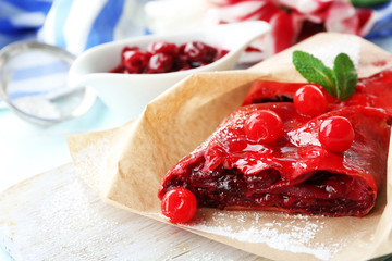 Cherry strudel with mint, closeup