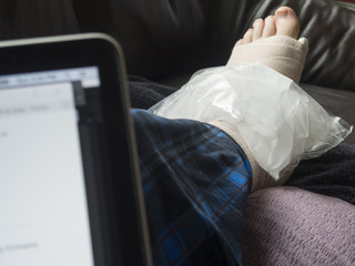 Working on a Computer While Icing an Injured Foot Which Is Broken, Fractured, or Sprained