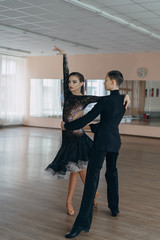 Professional dancers dancing in ballroom. Latin. 