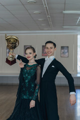 Professional dancers dancing in ballroom