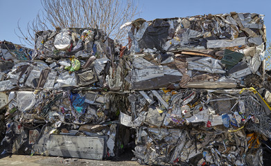 Scrap metal waste compacted cubes for recycling