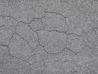 Obraz premium crack on asphalt road texture